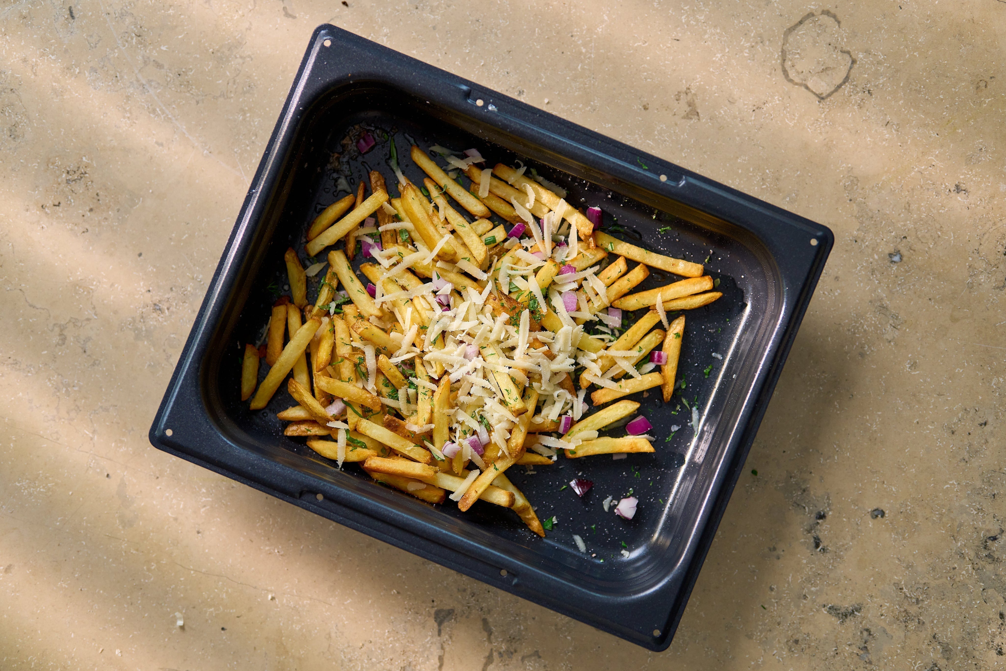 Kitta dig med vårt set av ugnsplåtar - Roast & Bake